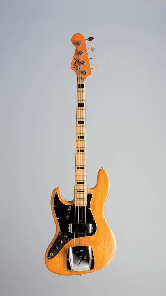 No. 9 1973 FENDER left-handed Jazz Bass model F-plate, Natural finish.